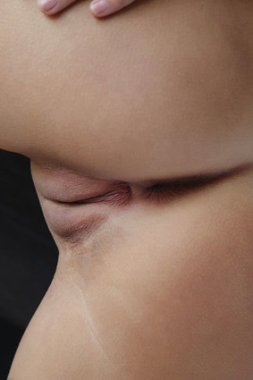 Sensual portrait of a brunette woman in a captivating pose, showcasing her elegance and allure. 14 pics